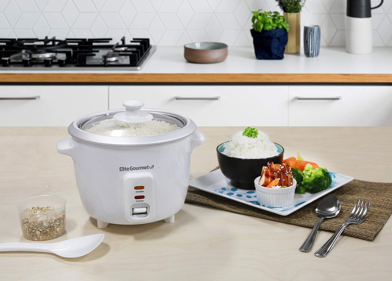 image:imageElite Gourmet ERC003BX Electric Rice Cooker with Automatic Keep Warm Makes Soups Stews Grains Hot Cereals 6 Cups Cooked 3 Cups Uncooked BlackWhite